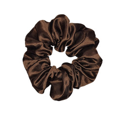 Sufermoe scrunchie next to coin showing 4.5-inch size for scale clarity