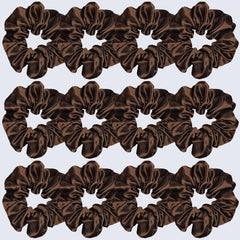 Sufermoe scrunchie worn on wrist to show scale and dual hair accessory use