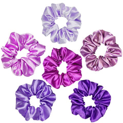 Sufermoe scrunchie held in hand to show 4.5-inch size for versatile hair types