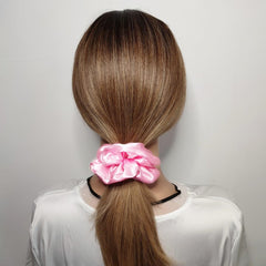 sufermoe satin texture close-up showing smooth weave and soft finish benefit: reduces hair friction
