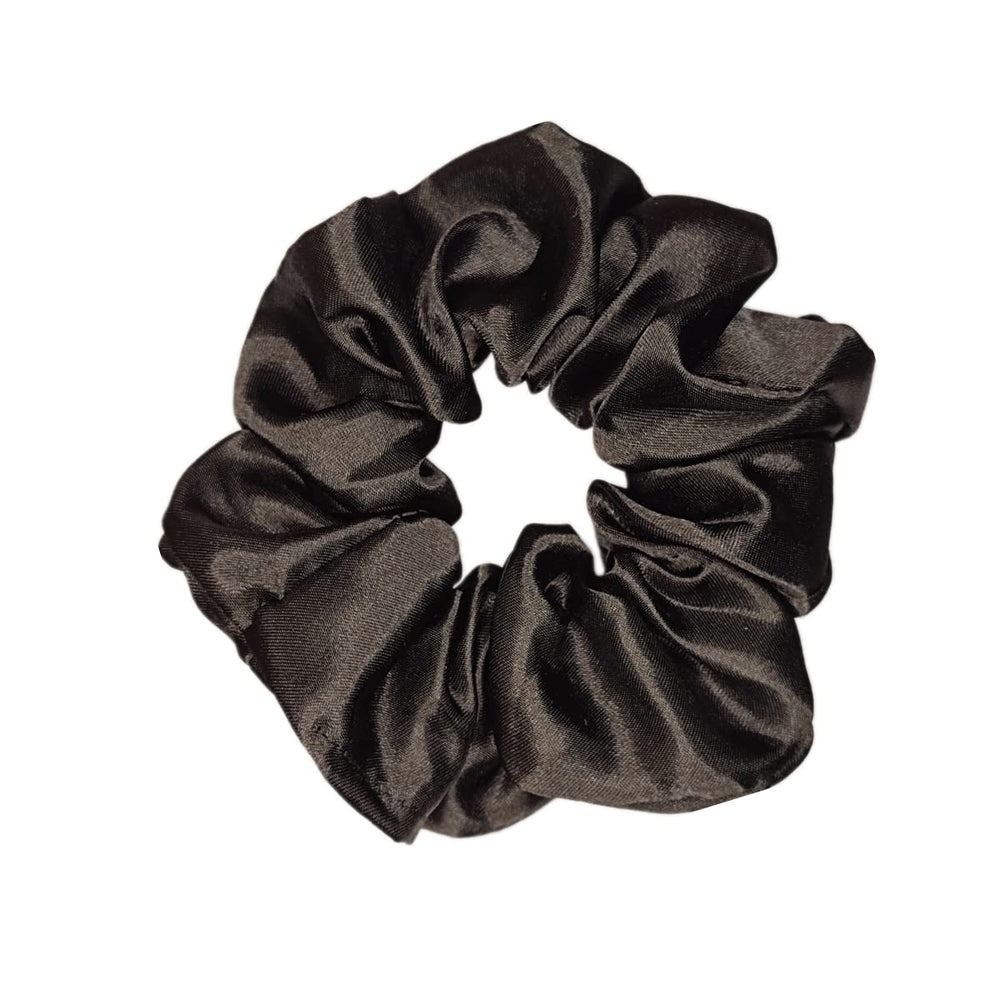Sufermoe scrunchie worn as wrist bracelet adding style and convenience