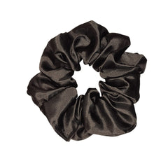 Sufermoe scrunchie worn as wrist bracelet adding style and convenience