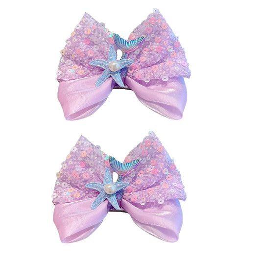 Suiwesey front packaging showing two mermaid hair bow clips, ready to gift