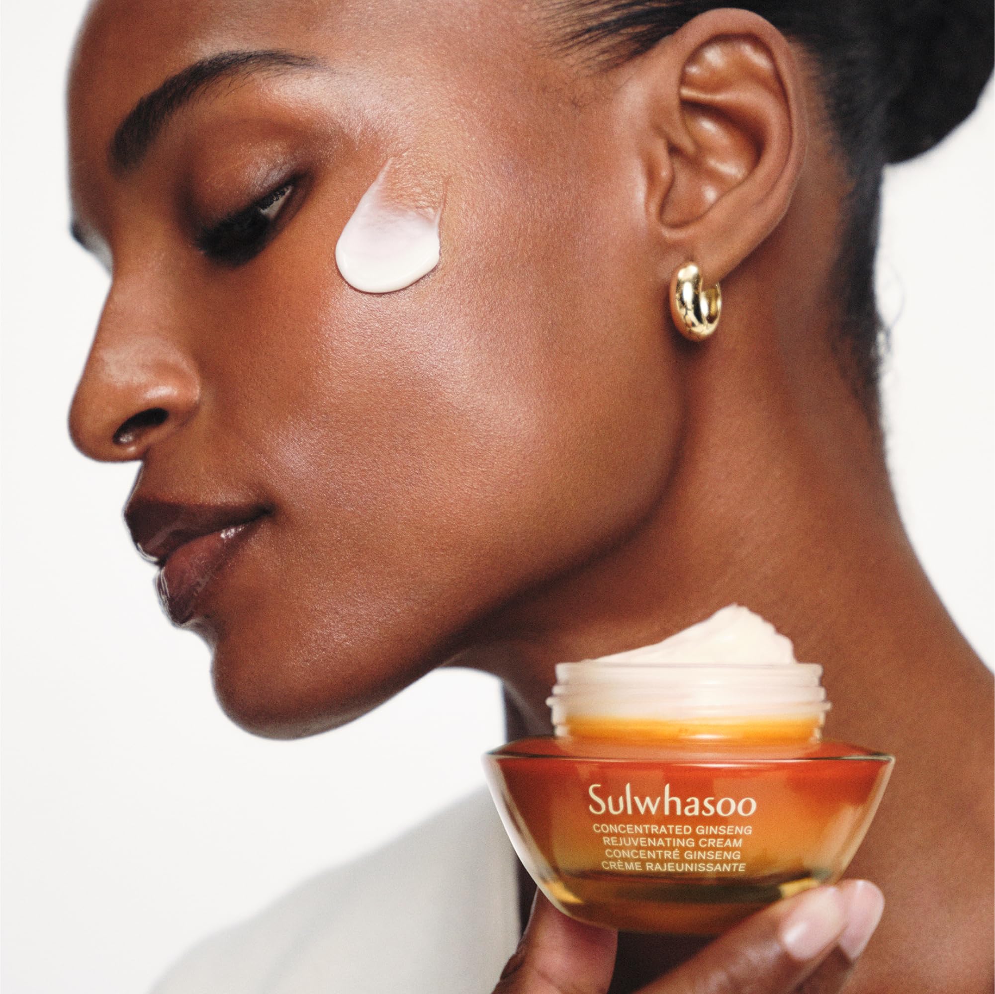 Sulwhasoo cream applied to hand illustrating absorbency and immediate hydration