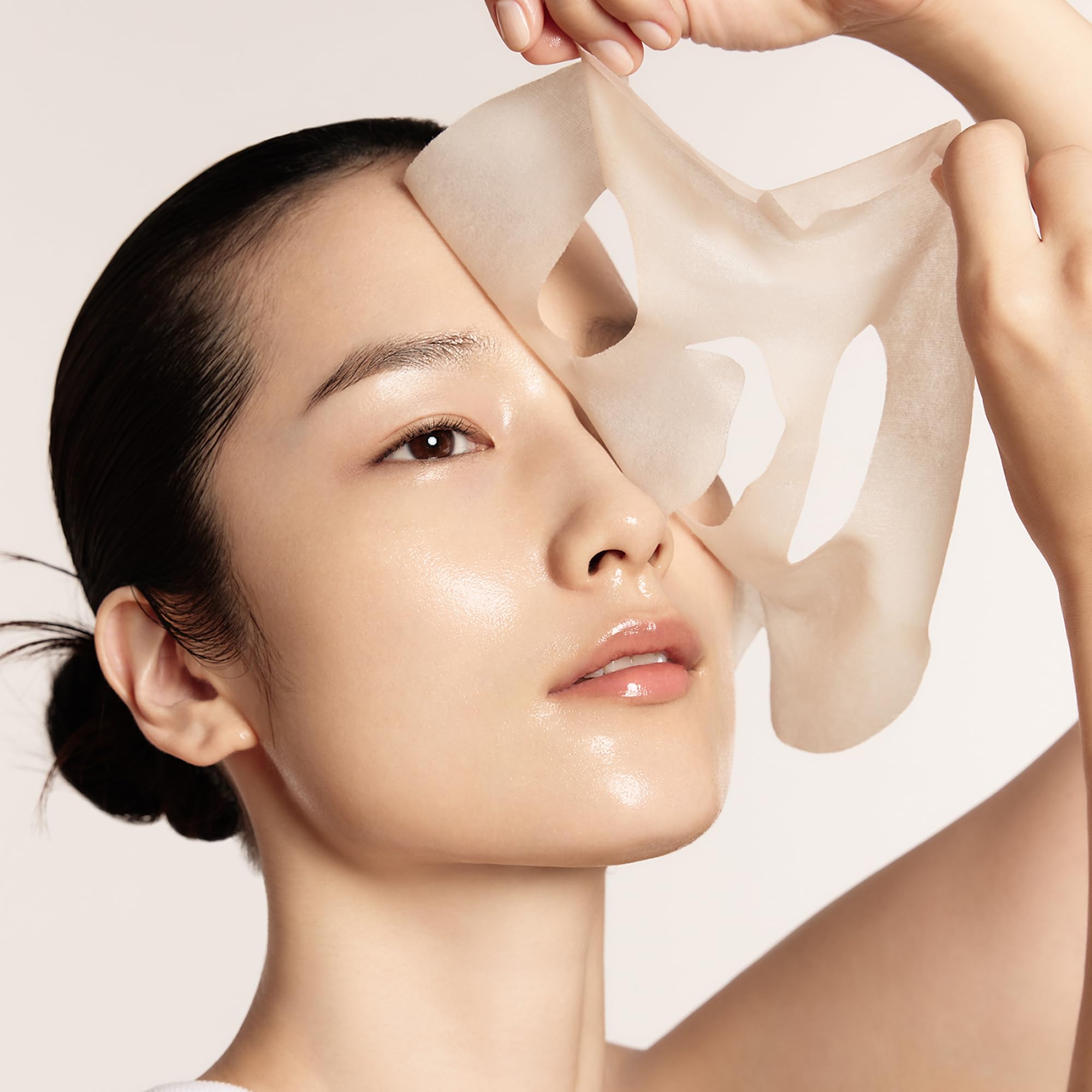 Sulwhasoo after-mask tapping remaining essence into skin for glow