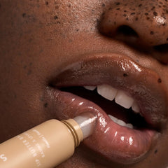 Applying belly balm on the belly demonstrating Summer Fridays nourishment and elasticity support