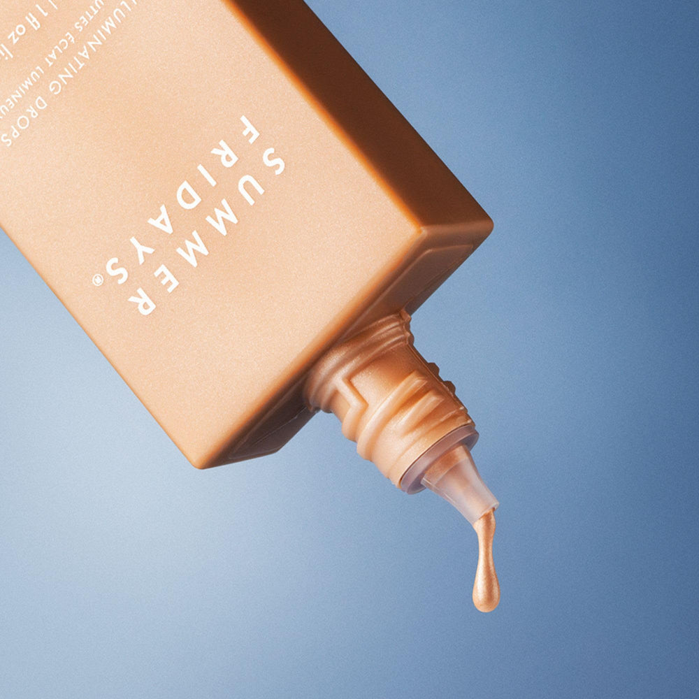 Summer Fridays texture swatched on hand showing hydrating dewy finish