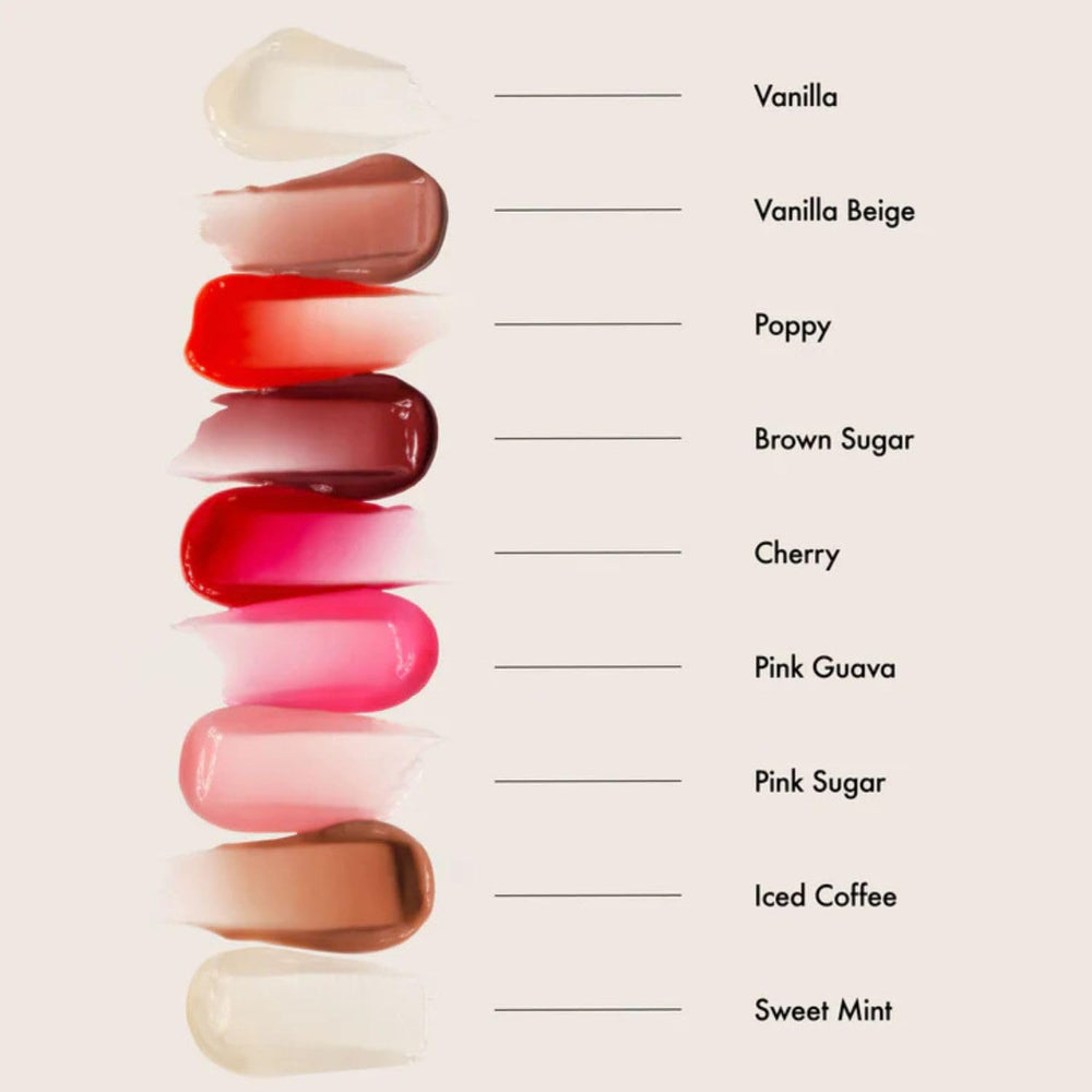 Summer Fridays balm in hand during daytime use showing easy on-the-go application