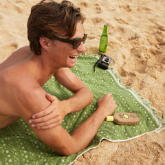 Sun Bum bottle label detail highlighting ingredients and SPF benefit