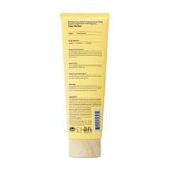 Sun Bum 6 fl oz tube held in hands to show true size and convenient travel benefit