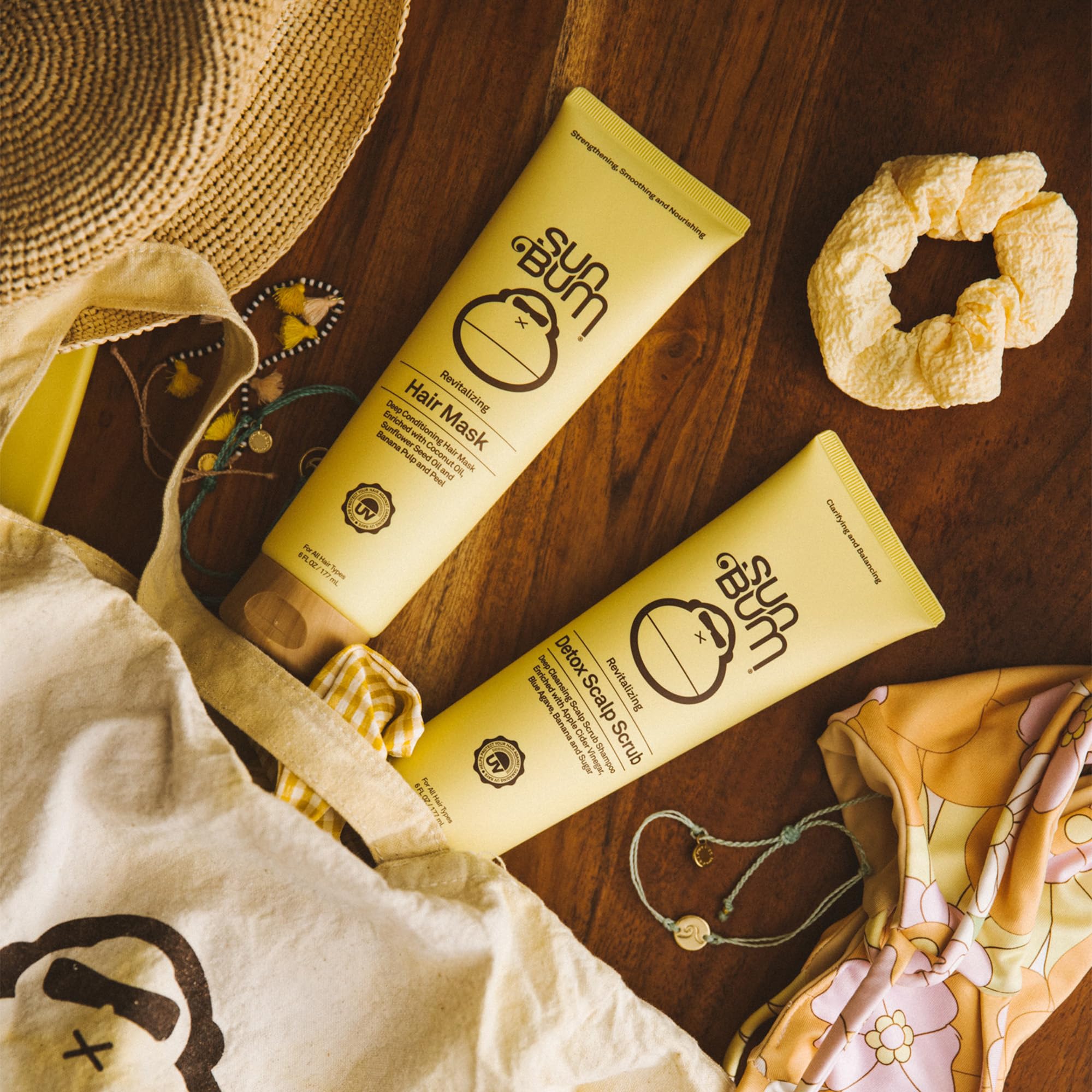 Sun Bum applying scrub to scalp for clearer, fresher roots