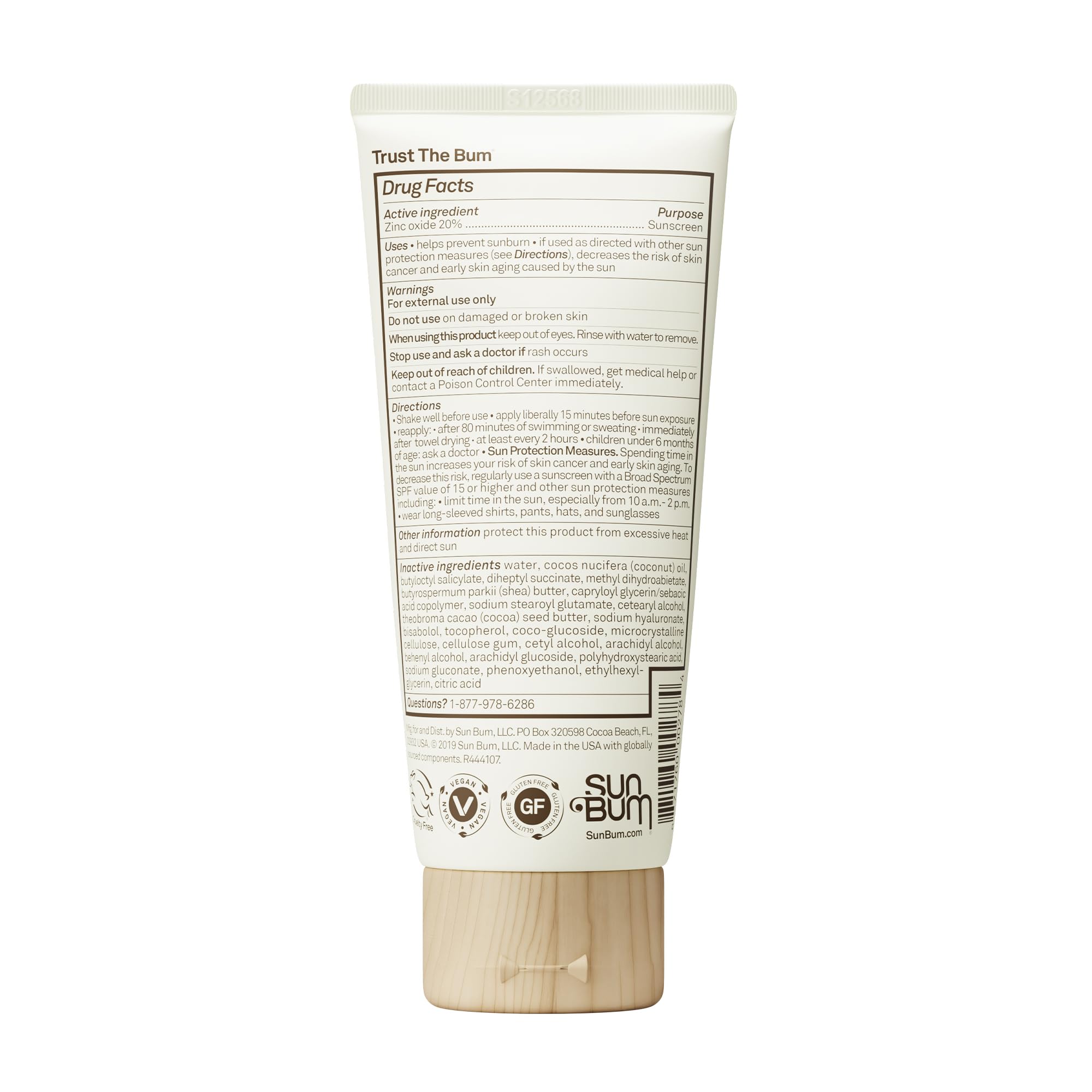 Sun Bum tube in a diaper bag at beach illustrating convenience and reef-safe formula