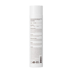 Sun Bum shampoo placed in bathroom with towel, shows easy daily curl care benefit