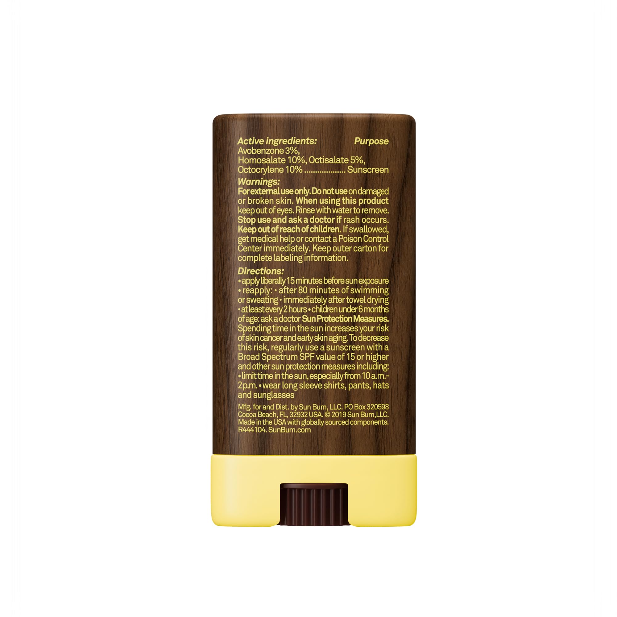 Sun Bum face stick on a beach towel illustrating water-resistant outdoor use