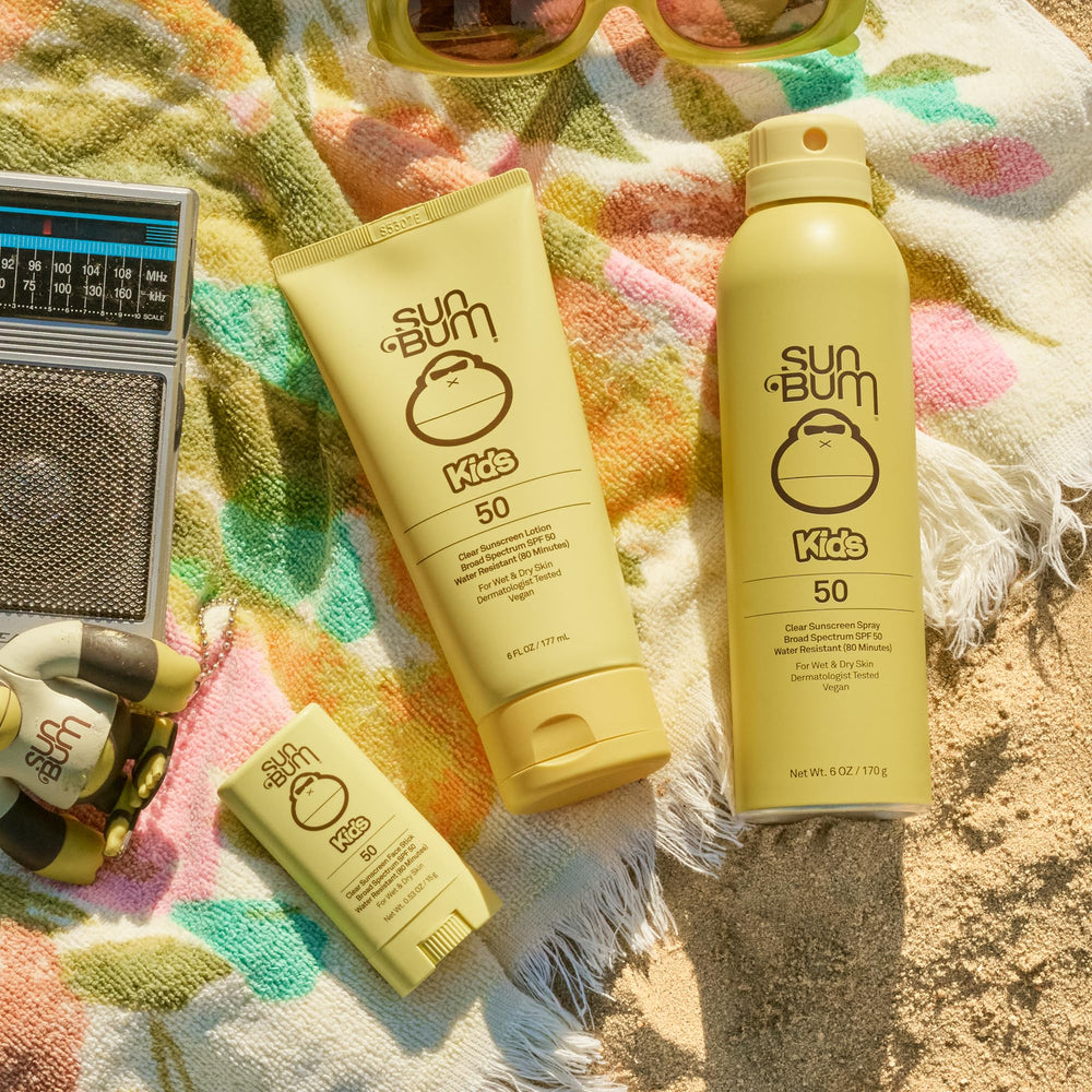 Sun Bum face stick held in hand to show travel-size 0.53 oz and easy portability