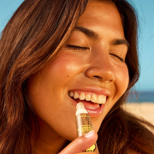 Sun Bum twist-up tube close-up demonstrating convenient pocket-sized design
