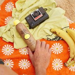 Sun Bum close-up of nozzle and label highlighting even spray