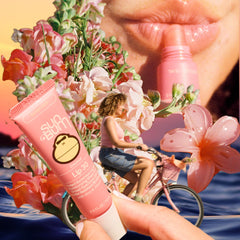 Sun Bum lip balm in hand showing compact 0.5 oz travel size