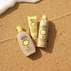 Sun Bum spray texture on skin illustrating non-greasy moisturizing protection