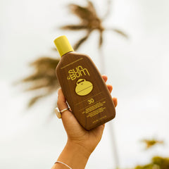 Sun Bum creamy lotion texture spread on skin for moisturizing feel
