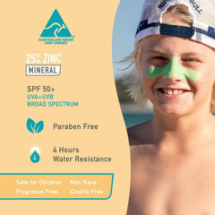 Sun Zapper stick being applied to a child’s cheek for visible coverage