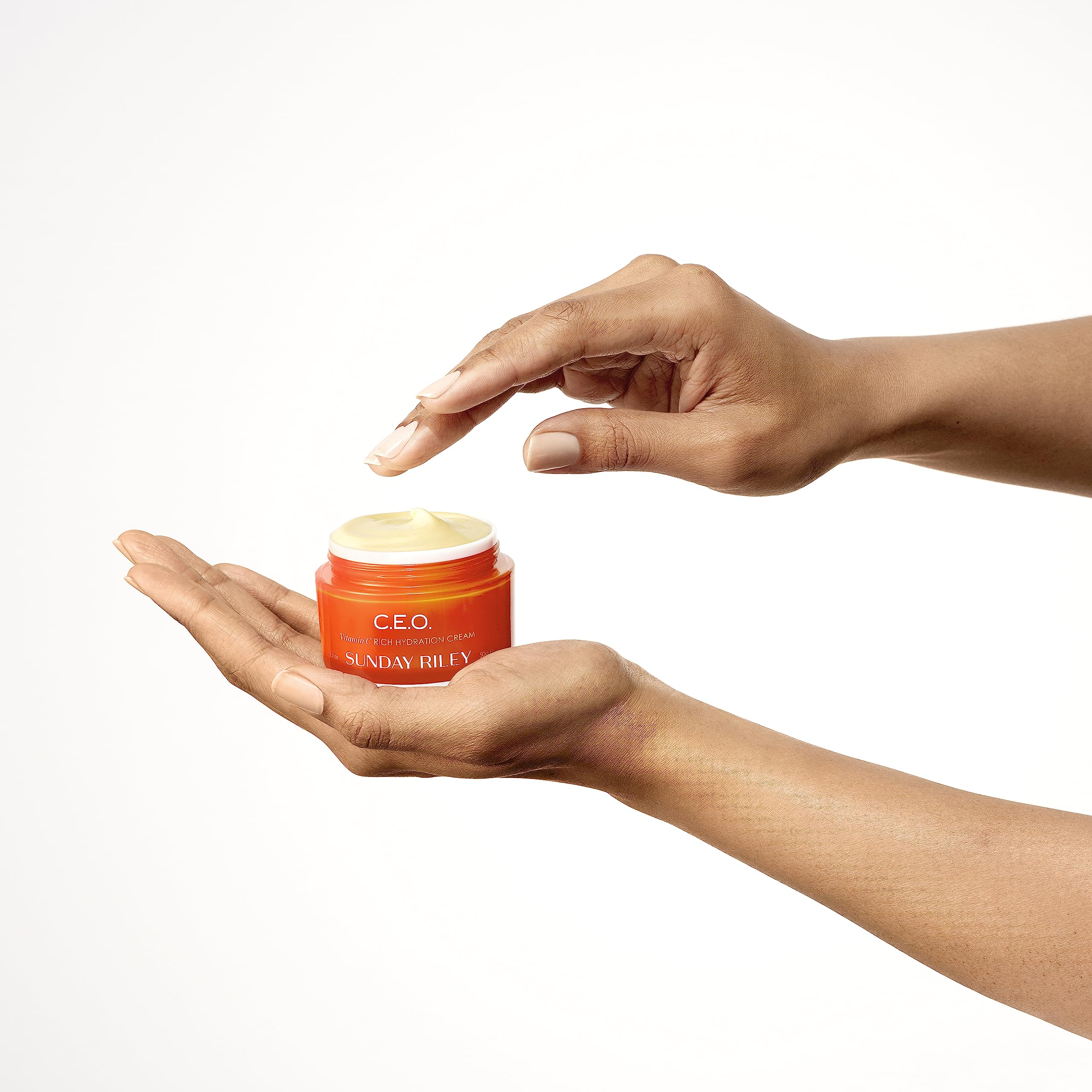 Sunday Riley C.E.O. open jar with spatula, illustrates hygienic application benefit
