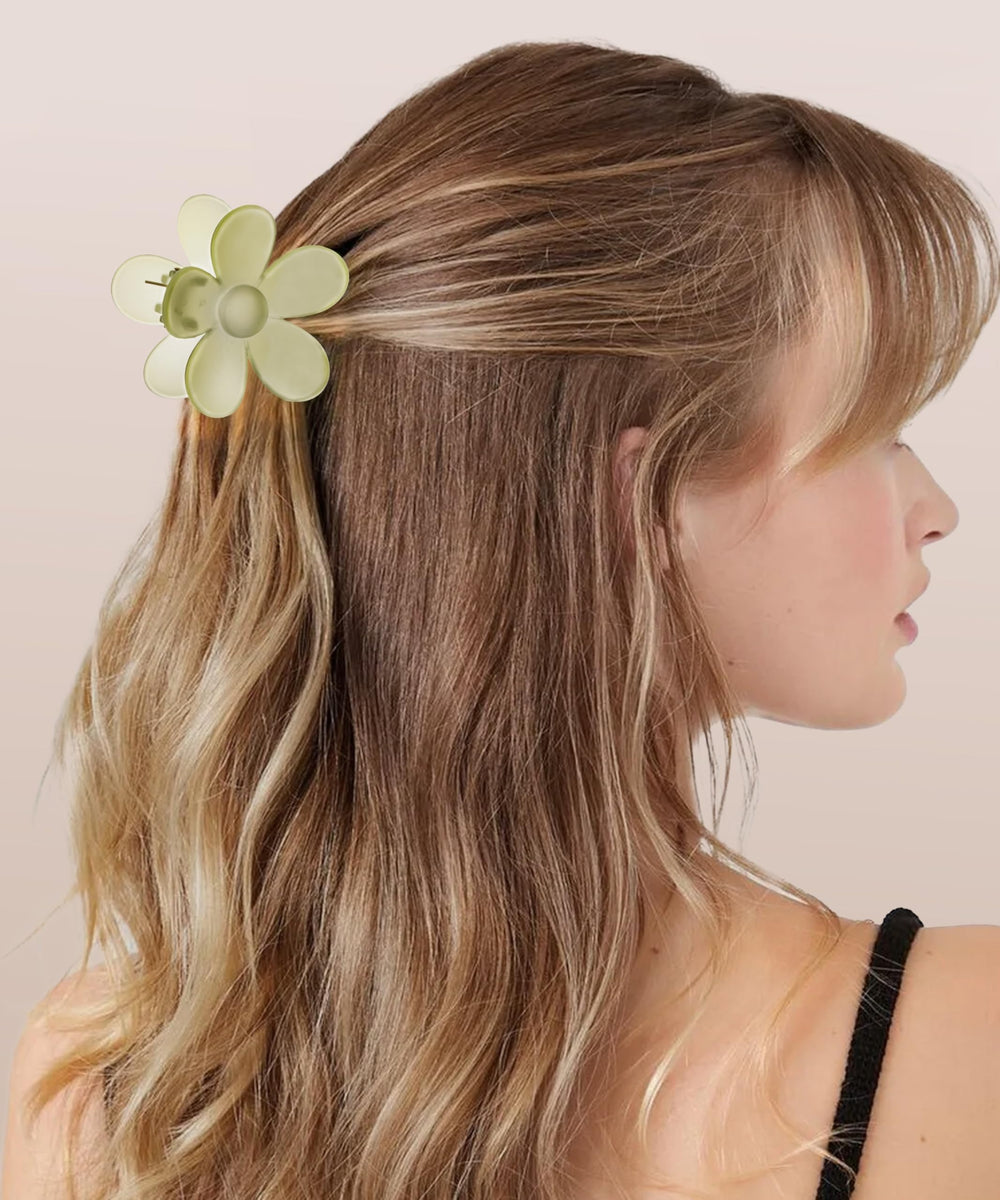 Sunolga clip holding thick curly hair in an updo for all-day hold