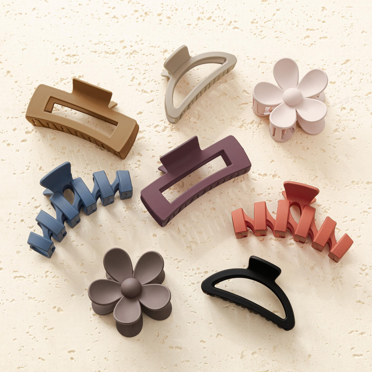 Sunolga flat-lay of eight clips showing color variety and easy selection benefit