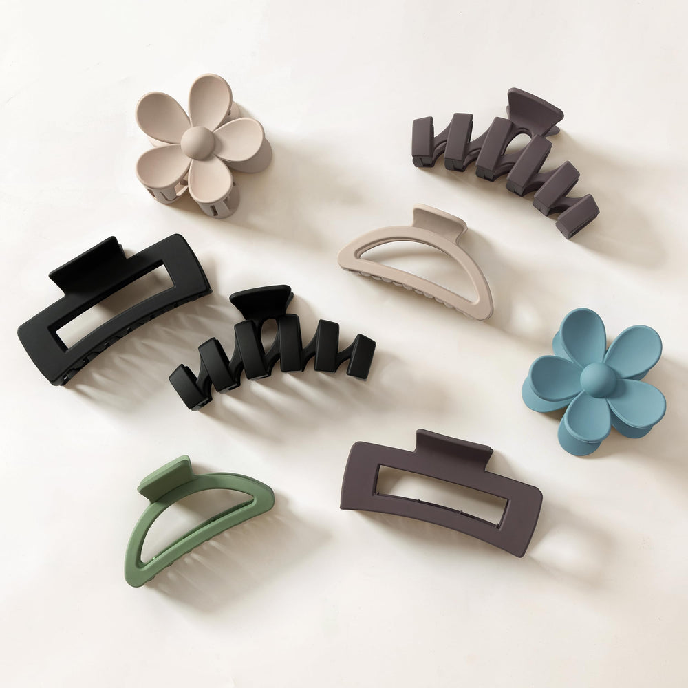 Sunolga flower clips arranged showing neutral colors and easy styling benefit