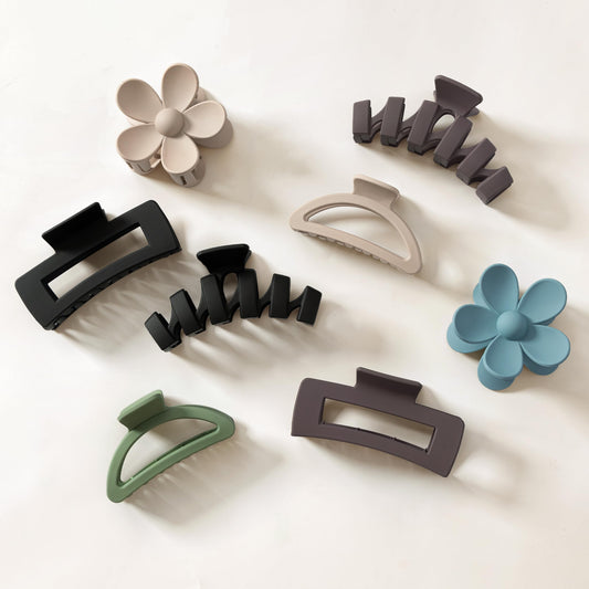 Sunolga flower clips arranged showing neutral colors and easy styling benefit