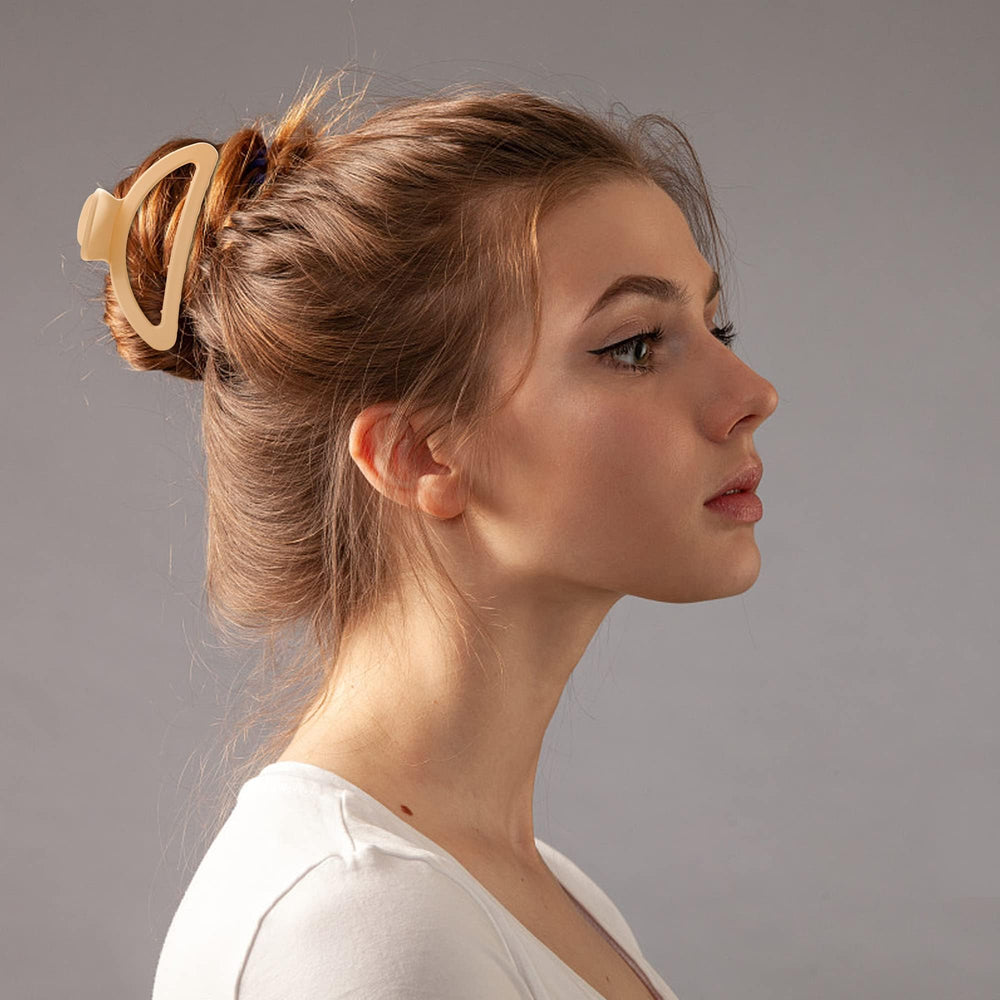 Sunolga clip holding thick hair in an elegant updo for secure styling
