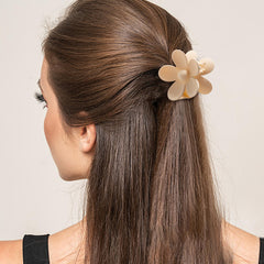 Sunolga hair clip in use creating an elegant updo for thick hair