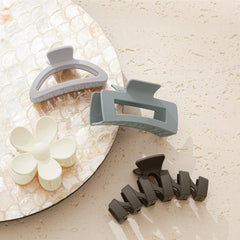 Sunolga clips arranged on vanity showing ready-to-wear styling benefit