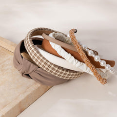 Sunolga headbands on model showing scale and fit for different head sizes