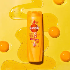 sunsilk in use on wet hair demonstrating easy detangling benefit