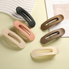 SUNTIESDAY matte clips paired with outfit showing stylish versatile accessory