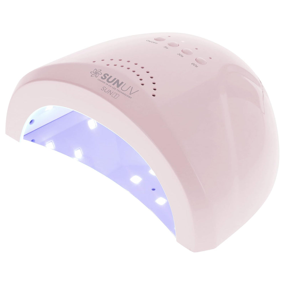 SUNUV SUNone front view showing glossy pink shell and opening for hands, fast curing benefit