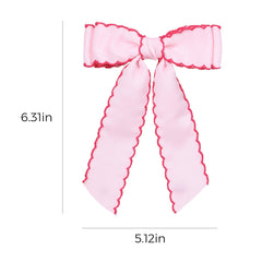 SUPCLIPS child wearing bow in ponytail illustrating flattering look and comfort