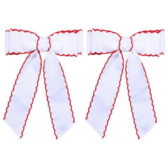 SUPCLIPS front view bow pair showing bold white and red contrast, bright accessory