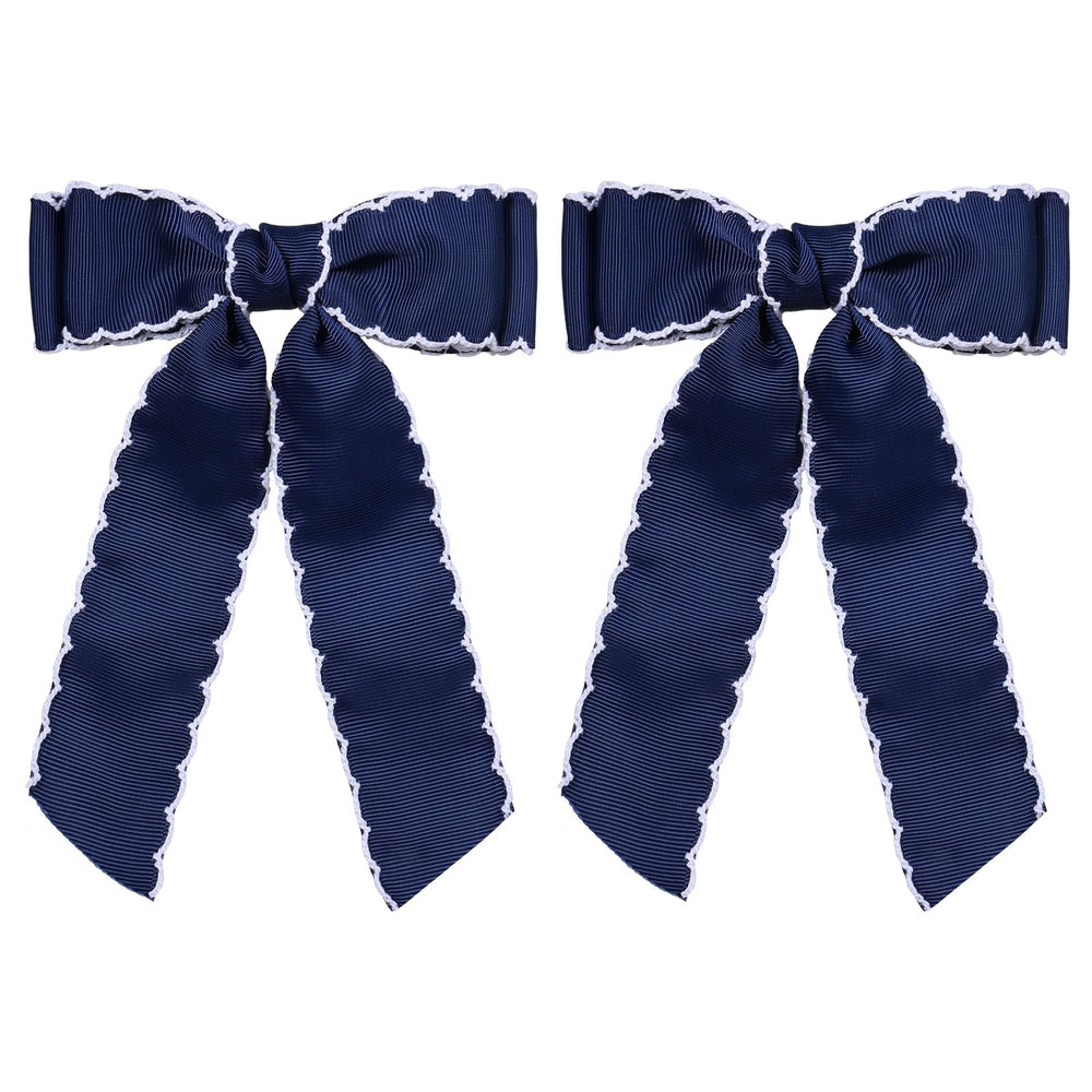 SUPCLIPS front view navy white bow showing classic contrast and polished finish