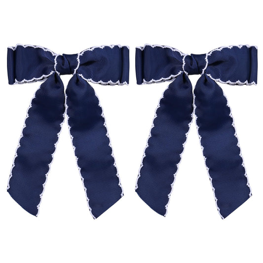 SUPCLIPS front view navy white bow showing classic contrast and polished finish