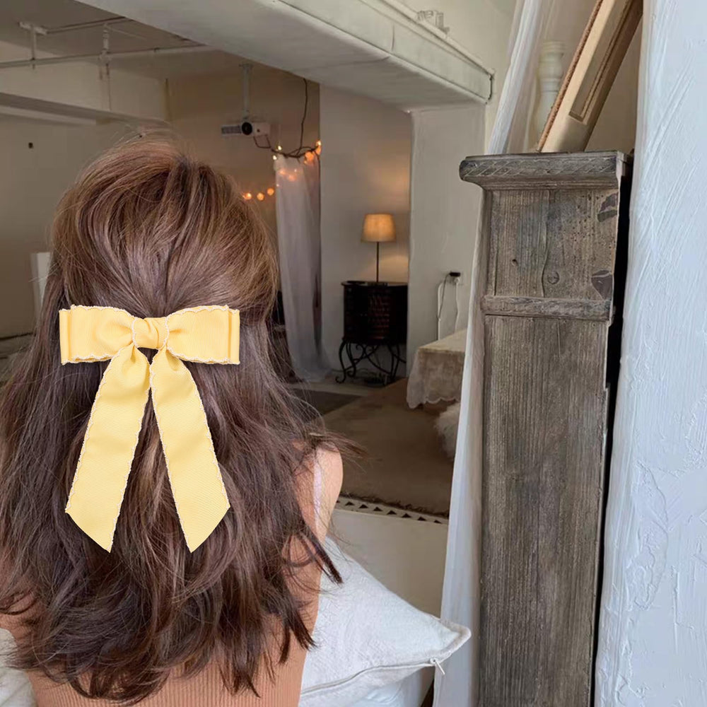 SUPCLIPS worn in a ponytail demonstrating visible accent and everyday charm benefit