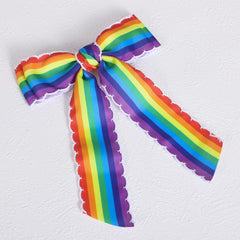 SUPCLIPS bows on a party outfit showing festive colorful accent