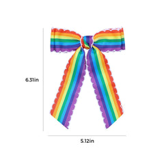 SUPCLIPS bow held in hand showing scale and wearable size