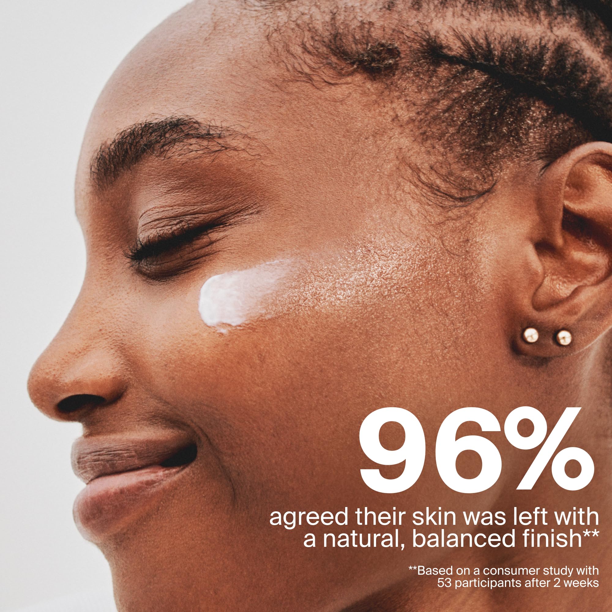 Supergoop! model applying moisturizer to face for smooth prep