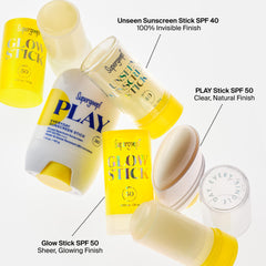 Supergoop! Glow Stick beside makeup essentials highlighting multiuse as highlighter and SPF
