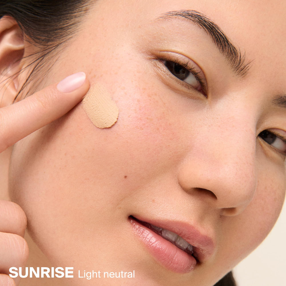 Supergoop! tint swatch blended on skin showing neutral coverage