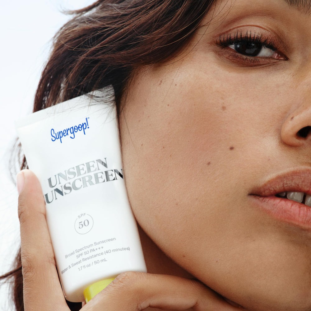 Supergoop! wrist swatch showing clear finish and quick-absorbing benefit