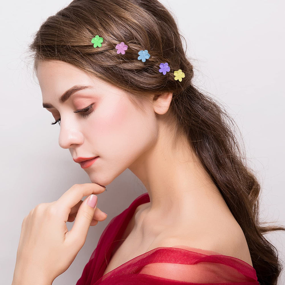 SuPoo clips worn in child's hair demonstrating secure styling and playful color