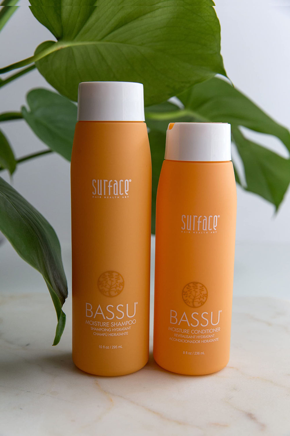 SURFACE Bassu lather in hand demonstrating gentle foam and easy rinsing benefit